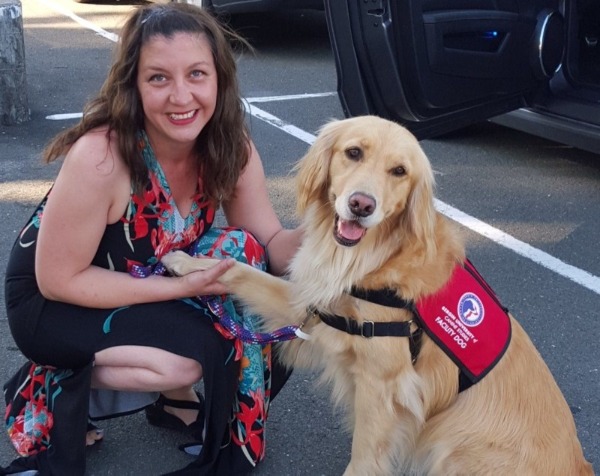 Trainer Elisa Rivera and service dog